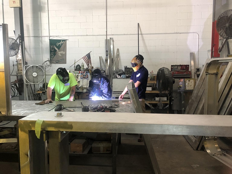 Sign Manufacturing Day Students Welding at PSCO