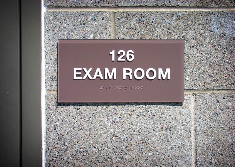 Exam Room ADA sign